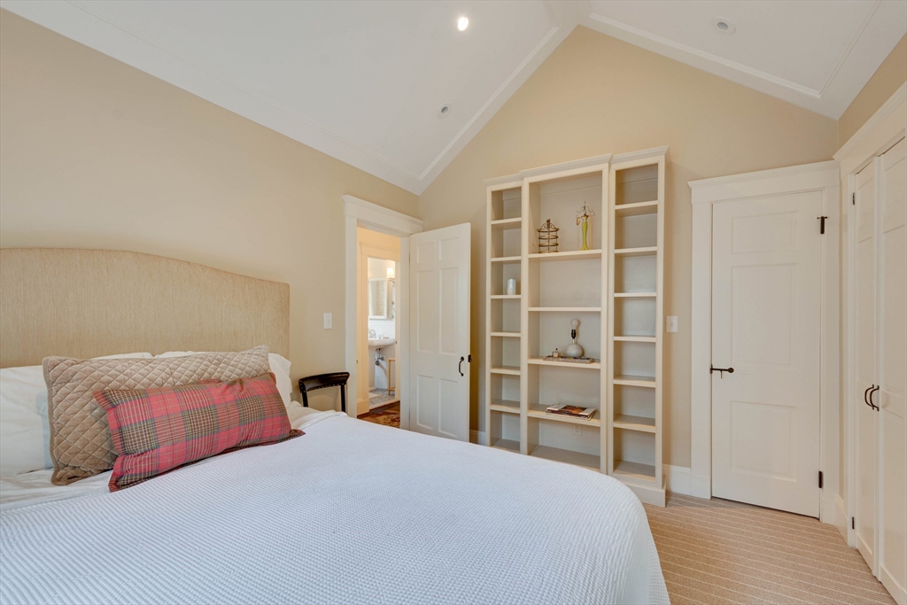 24 Cleveland Road Needham, MA 02492 - Photo 21 of 42 a bedroom with a bed and closet