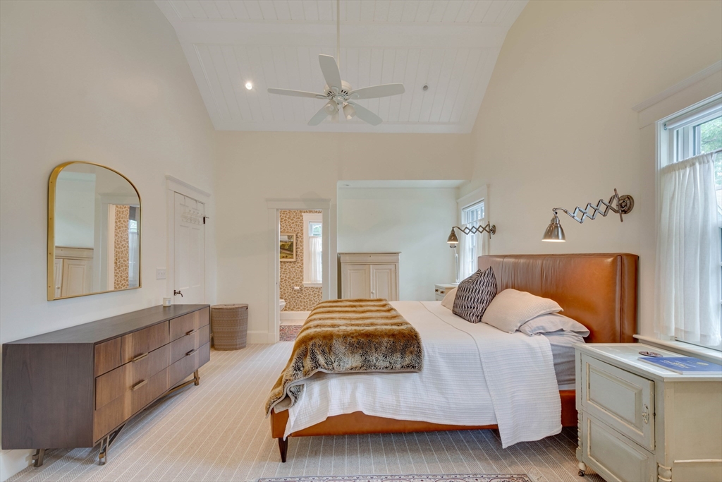 24 Cleveland Road Needham, MA 02492 - Photo 25 of 42 a bedroom with a bed and window