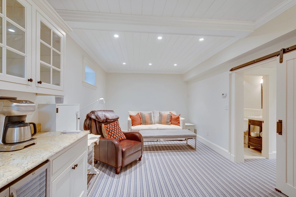 24 Cleveland Road Needham, MA 02492 - Photo 32 of 42 a living room with furniture and a couch