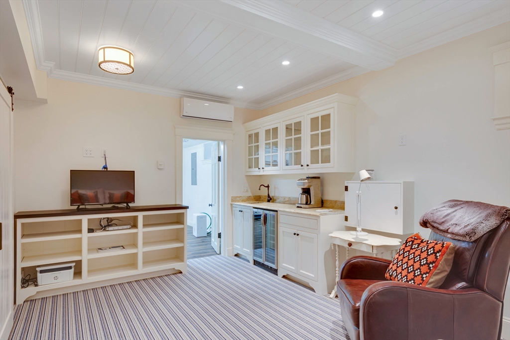 24 Cleveland Road Needham, MA 02492 - Photo 33 of 42 a room with furniture and windows