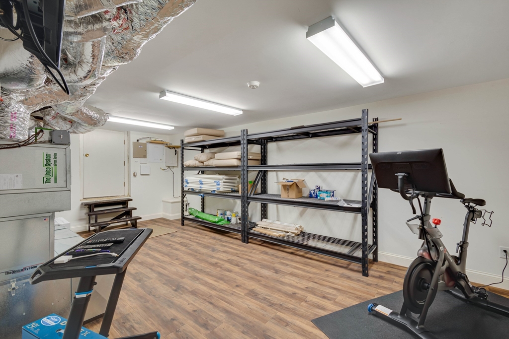 24 Cleveland Road Needham, MA 02492 - Photo 34 of 42 a view of a room with gym equipment