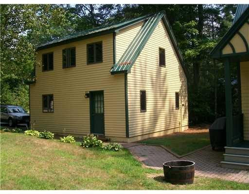 166 Highland Road Bridgton, ME 04009 - Photo 6 of 35 Parking Lot/Garage. Side view garage...