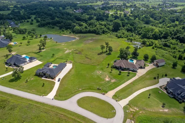 an aerial view of a pool