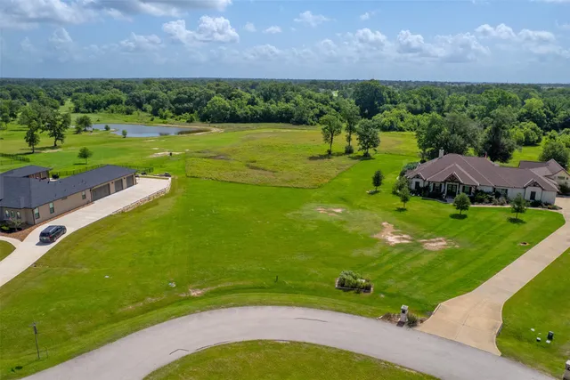 a view of a golf course with a garden