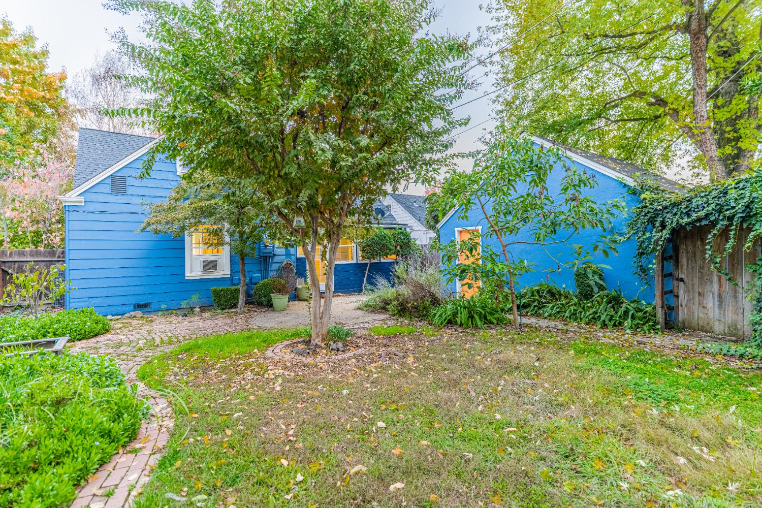 435 Olive Avenue Modesto, CA 95350 - Photo 19 of 29 a view of a house with a yard