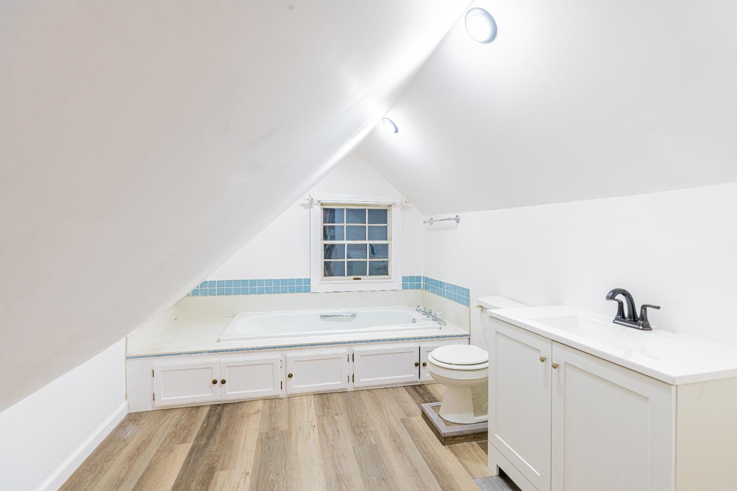 435 Olive Avenue Modesto, CA 95350 - Photo 29 of 29 a bathroom with a sink toilet and shower