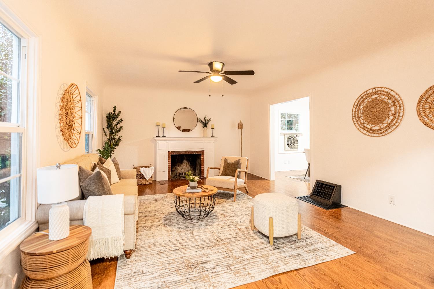 435 Olive Avenue Modesto, CA 95350 - Photo 6 of 29 a living room with furniture a fireplace and a table