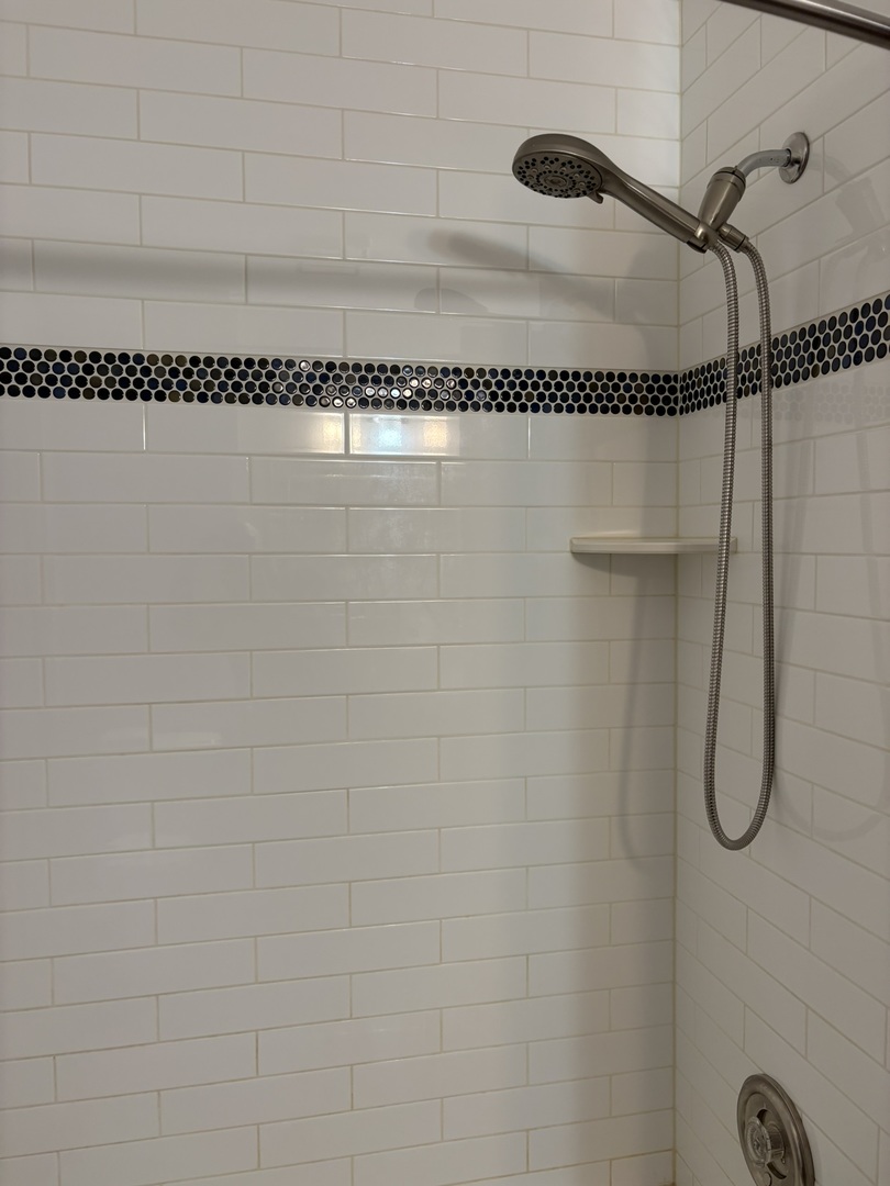 609 West Gartner Road Naperville, IL 60540 - Photo 11 of 23 a bathroom with a shower