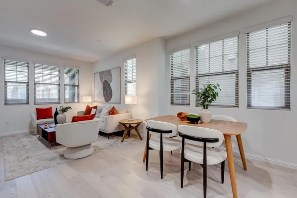 a living room with furniture and windows
