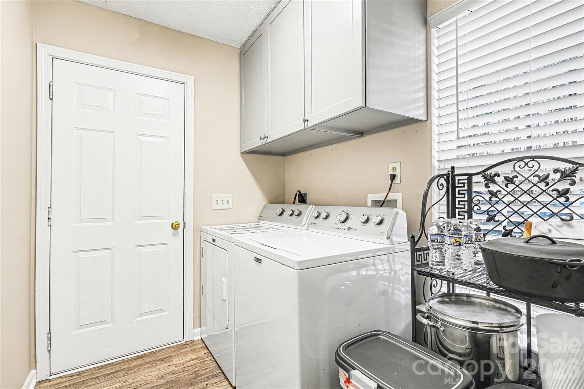 228 Creek View Road Mooresville, NC 28117 - Photo 17 of 40 a utility room with dryer and washer