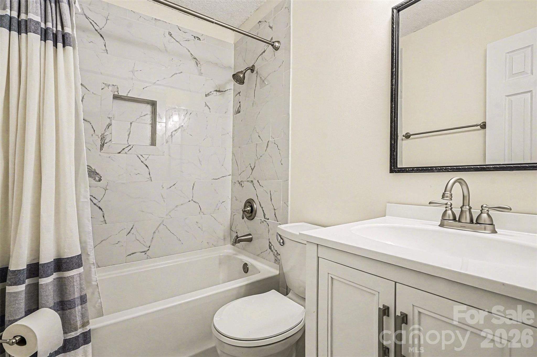 228 Creek View Road Mooresville, NC 28117 - Photo 23 of 40 a bathroom with a sink toilet and shower