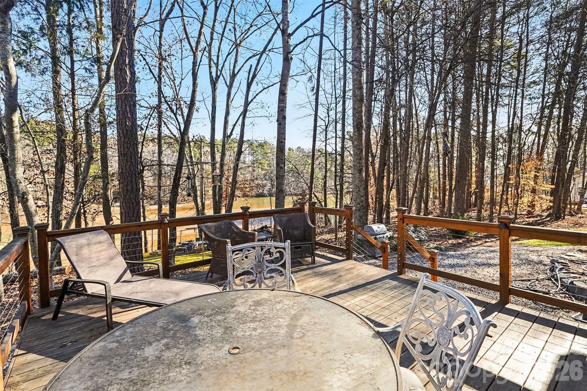 228 Creek View Road Mooresville, NC 28117 - Photo 31 of 40 a view of a chairs and tables in the patio