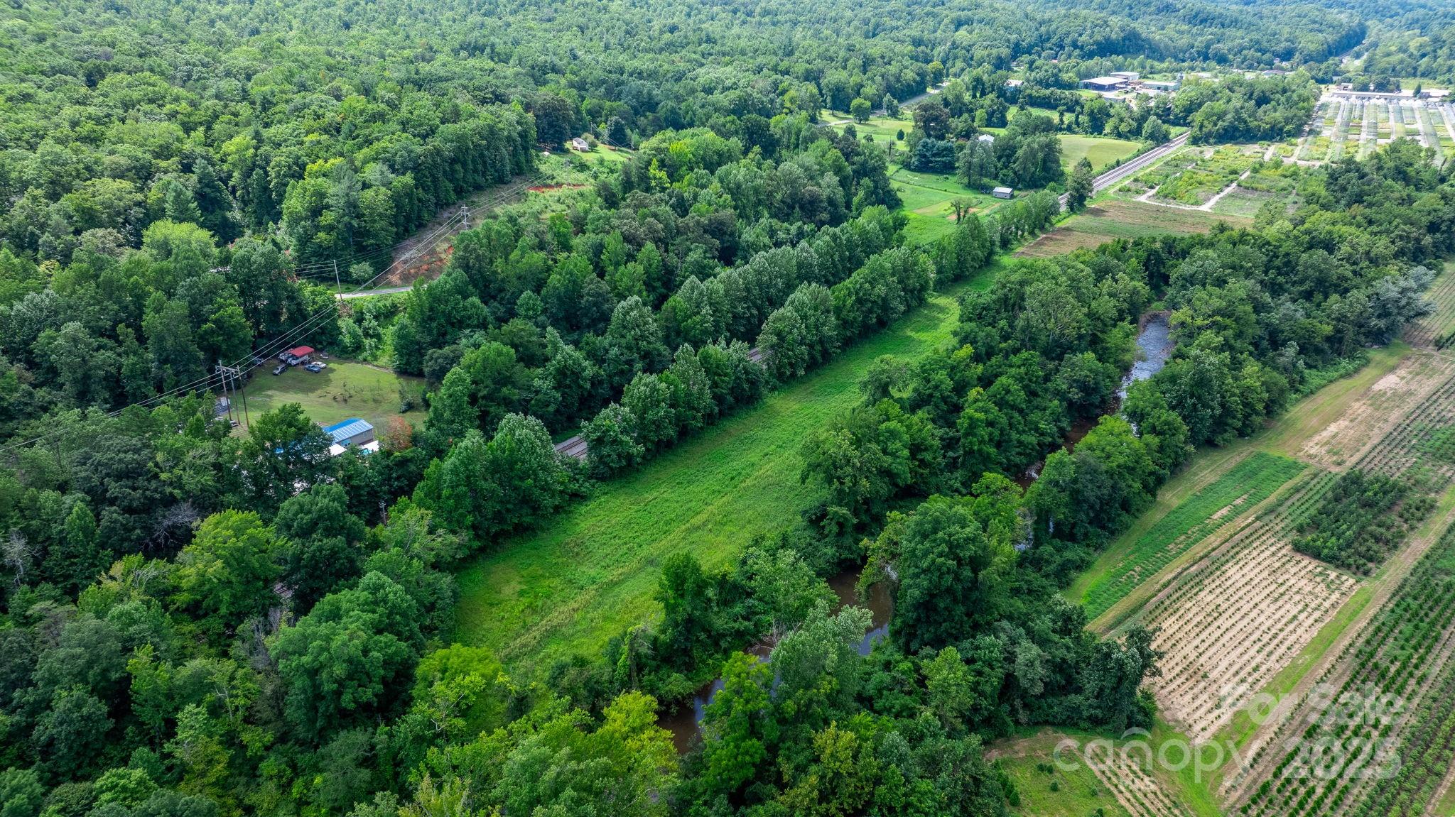 0 Old Linville Road Marion, NC 28752 - Photo 17 of 32 an aerial view of residential house with outdoor space and trees all around