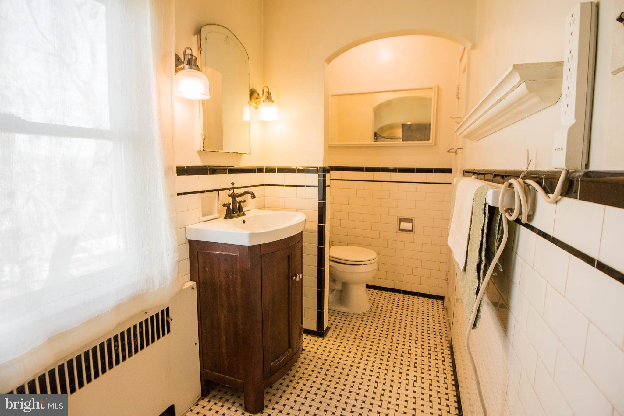 410 East Joppa Road Towson, MD 21286 - Photo 14 of 24 Upper Level Full Bath with Natural Light