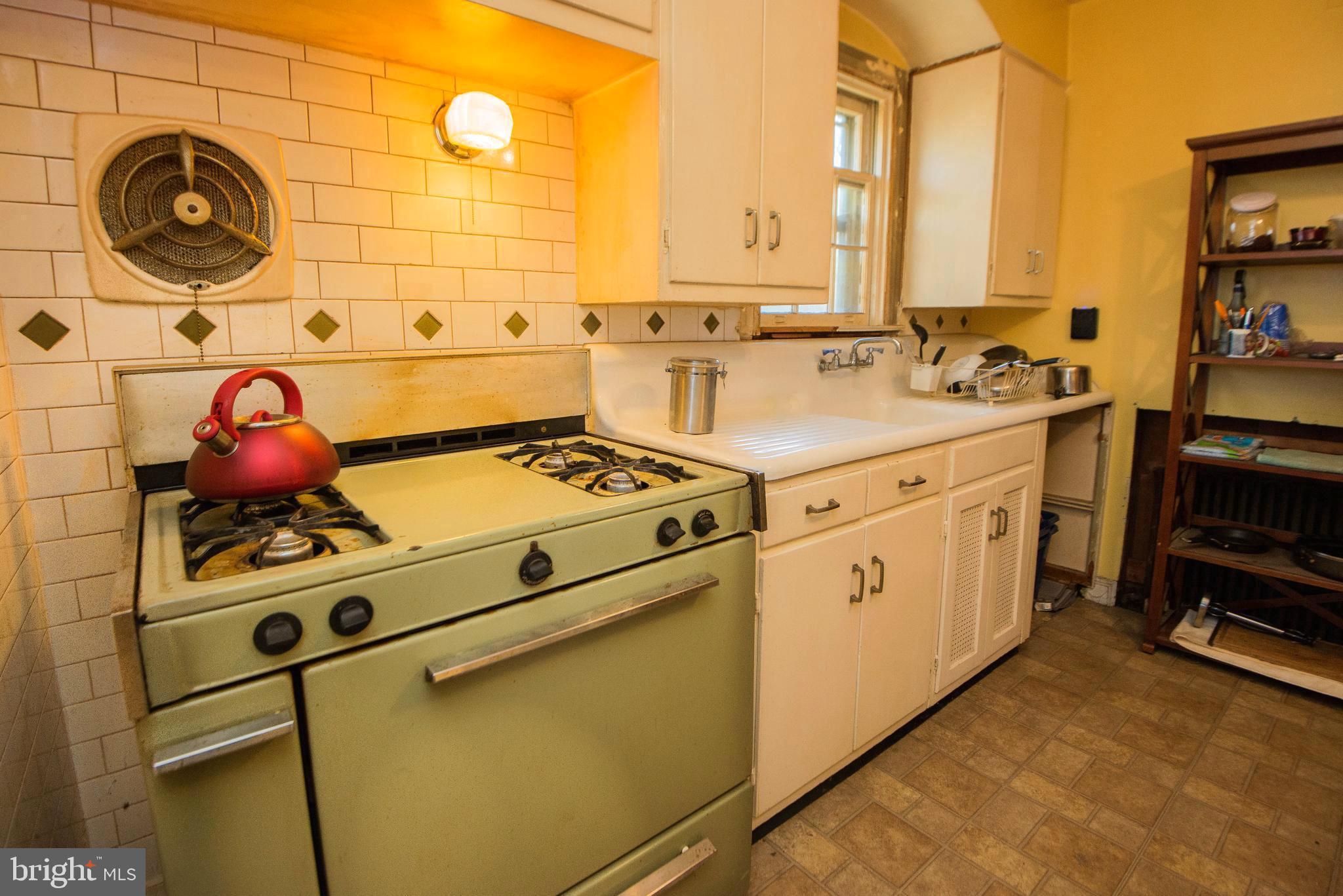 410 East Joppa Road Towson, MD 21286 - Photo 9 of 24 Kitchen includes Unique, Antique Gas Burning Stove