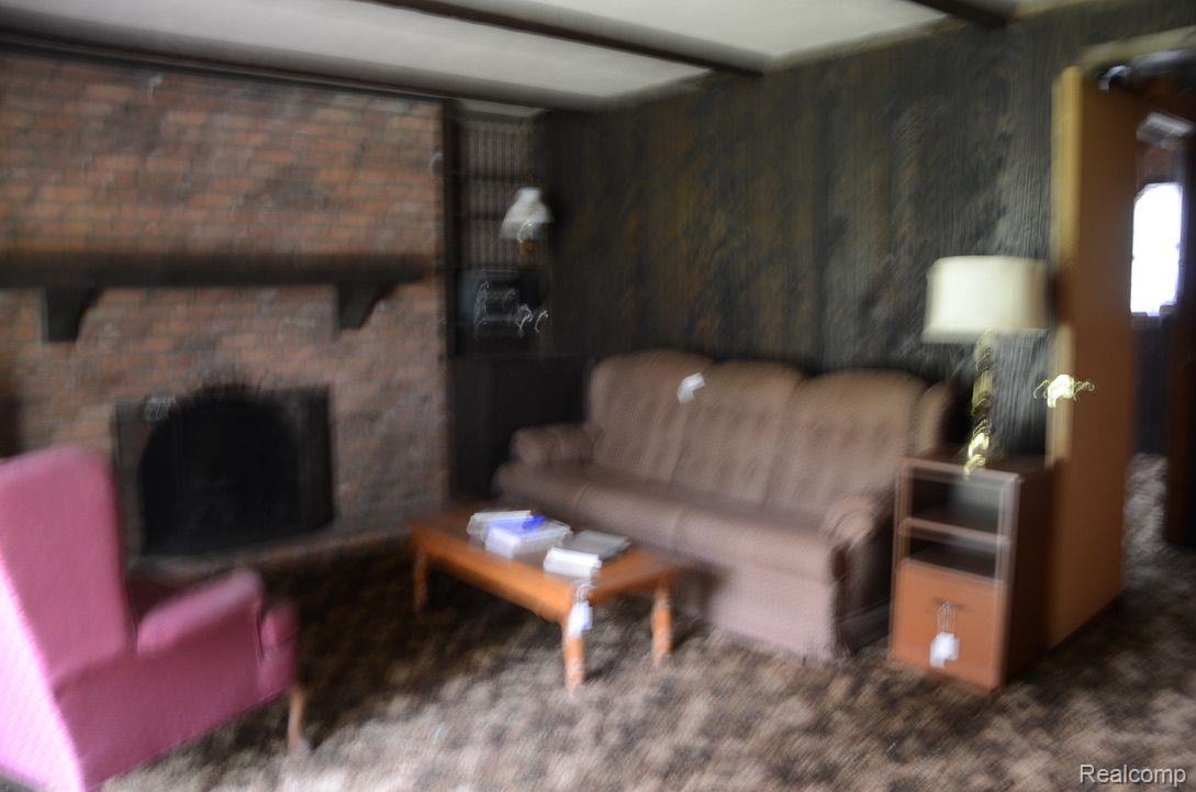 4789 Spears Road Pinckney, MI 48169 - Photo 17 of 47 Lower Level Family Room w/Fireplace
