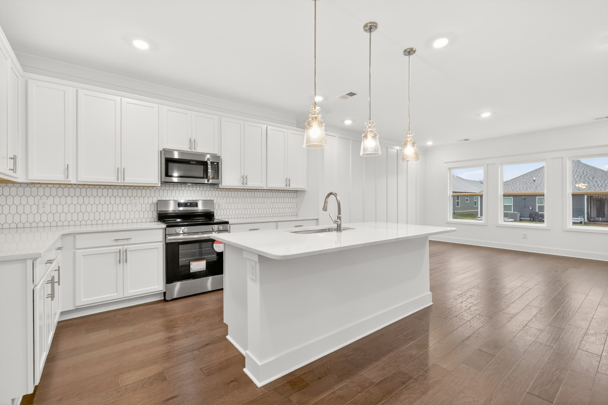 433 Charlie Place White House, TN 37188 - Photo 14 of 30 a large kitchen with kitchen island a sink stainless steel appliances and cabinets