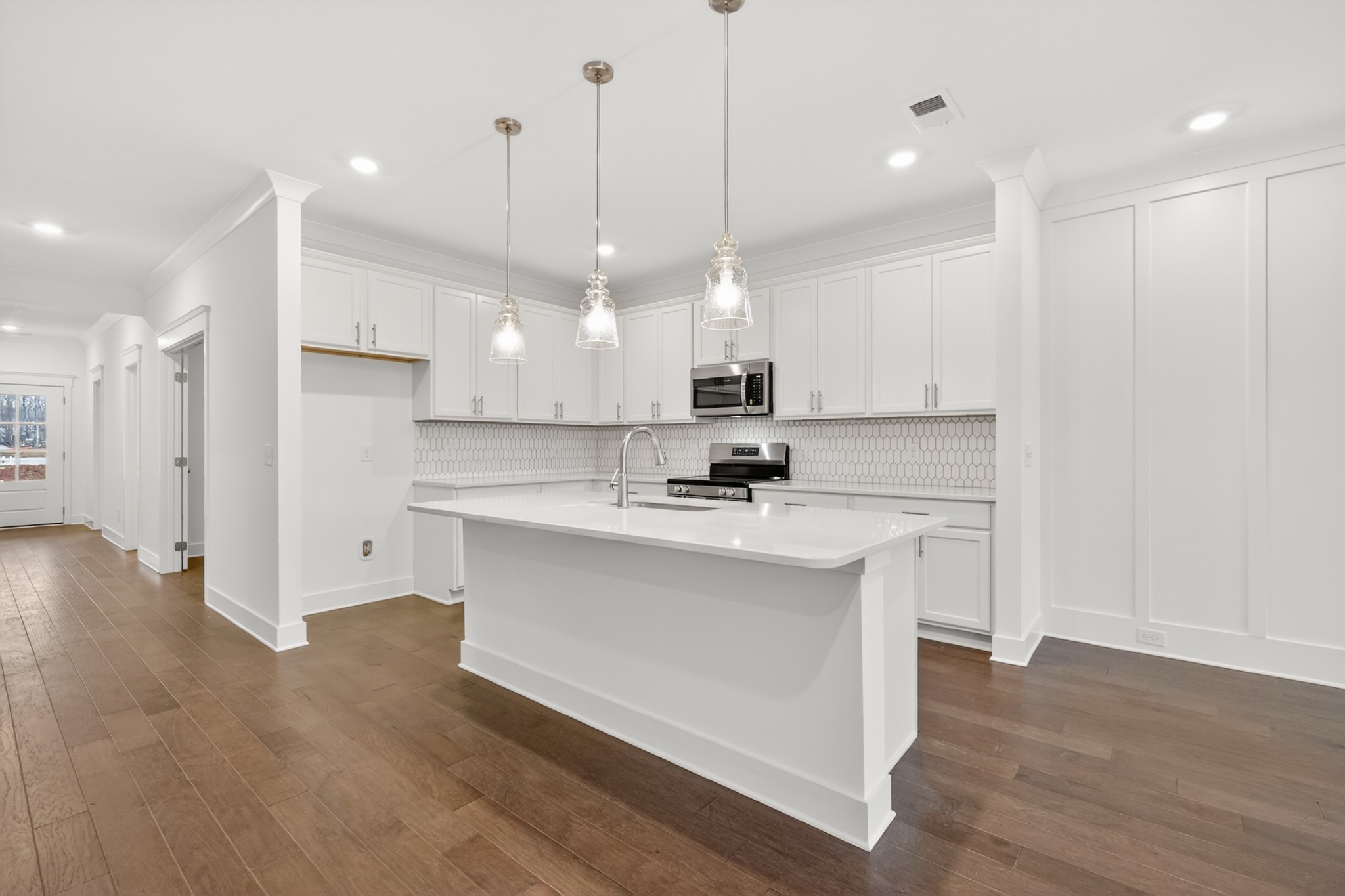 433 Charlie Place White House, TN 37188 - Photo 15 of 30 a view of a kitchen with a refrigerator a sink and a wooden floor