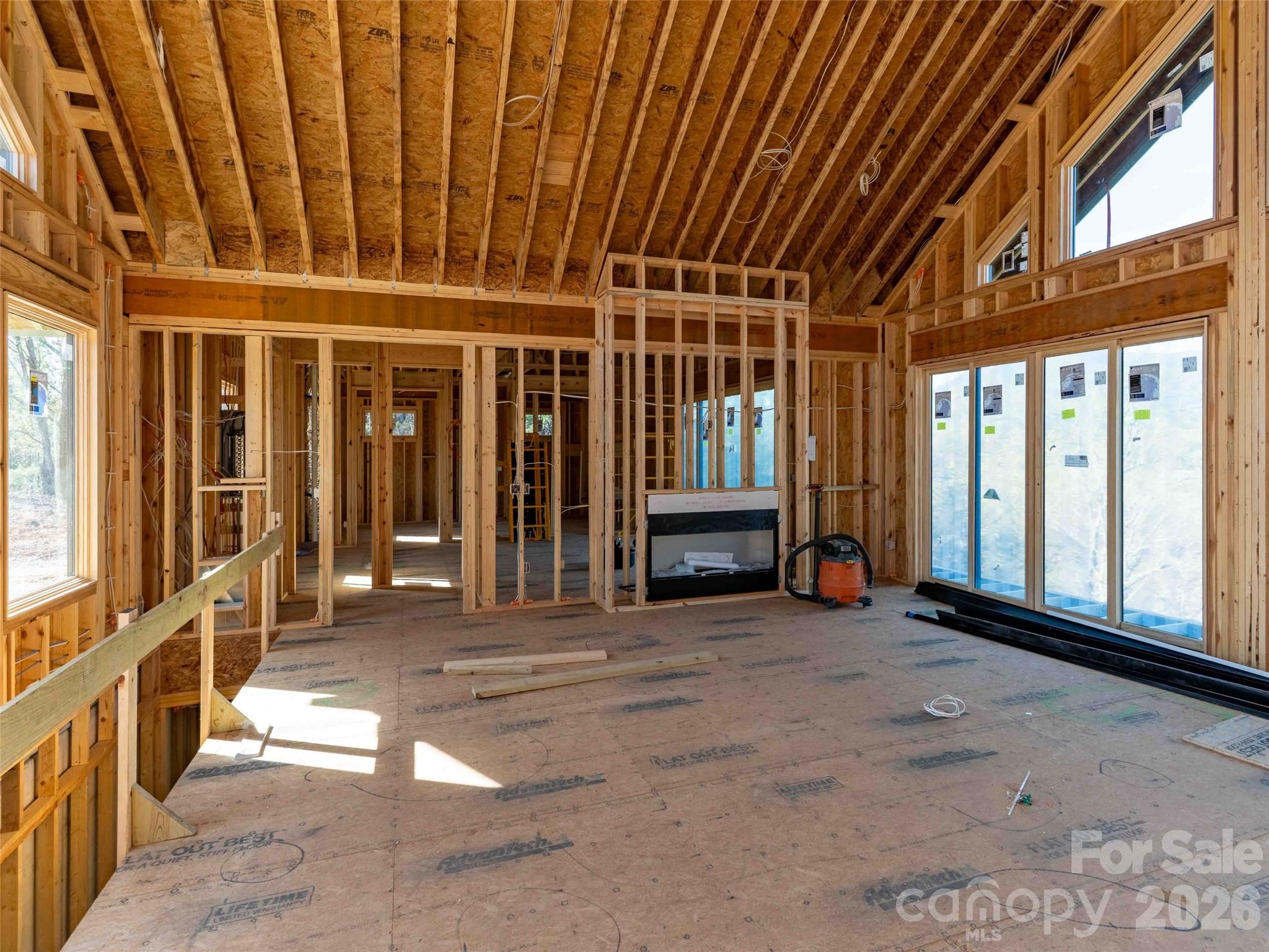 788 Deep Gap Farm Road East Mill Spring, NC 28756 - Photo 33 of 48 a view of an empty room with stairs
