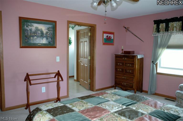 8503 Branch Road Litchfield, OH 44253 - Photo 7 of 25 After a long day, retreat to the private master suite with oversized walkin closet and master bath.