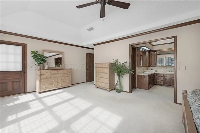 a view of a livingroom with furniture and windows