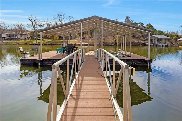 a view of a balcony with chairs
