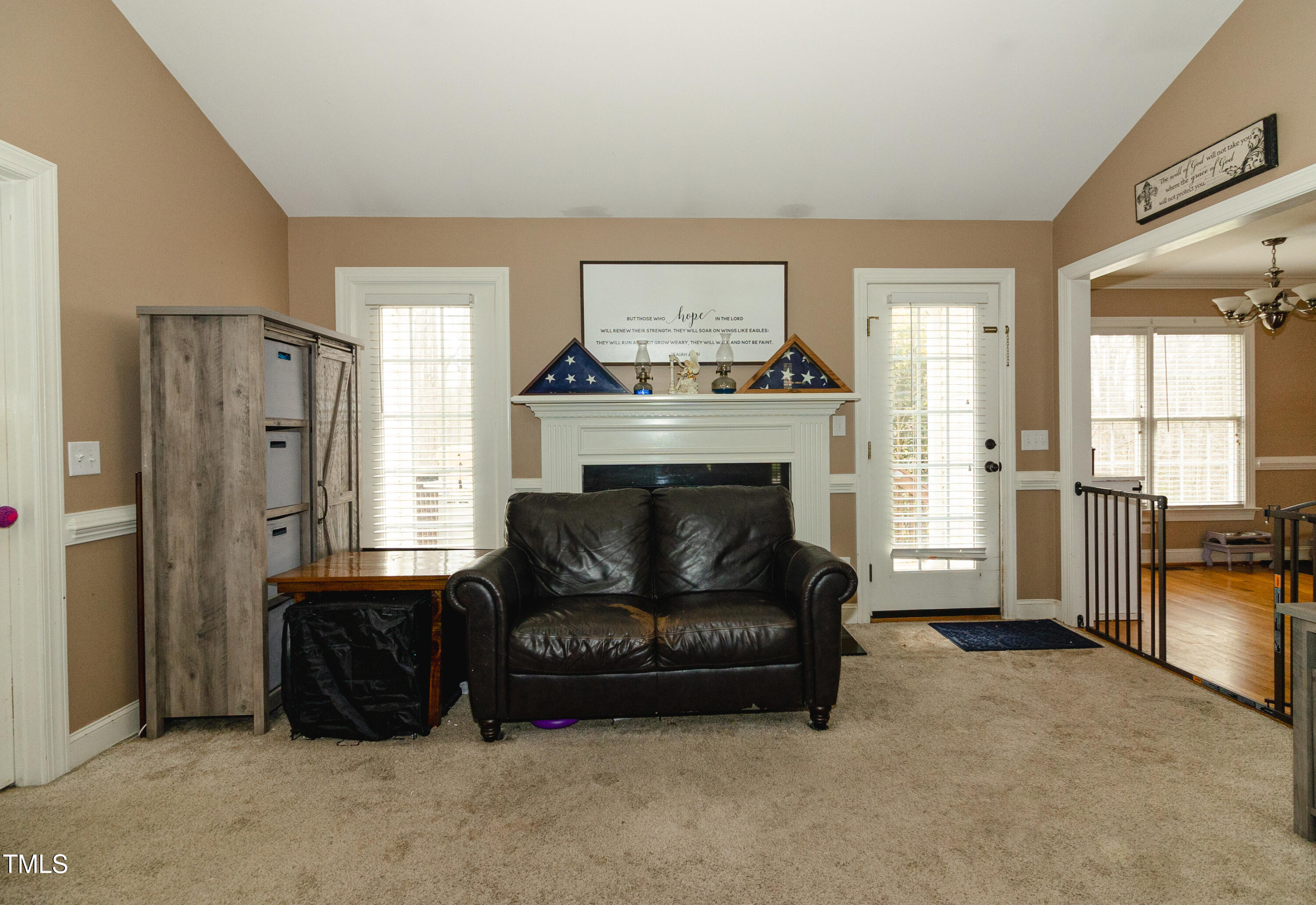 102 Younger Road Roxboro, NC 27573 - Photo 15 of 23 a living room with furniture and a fireplace