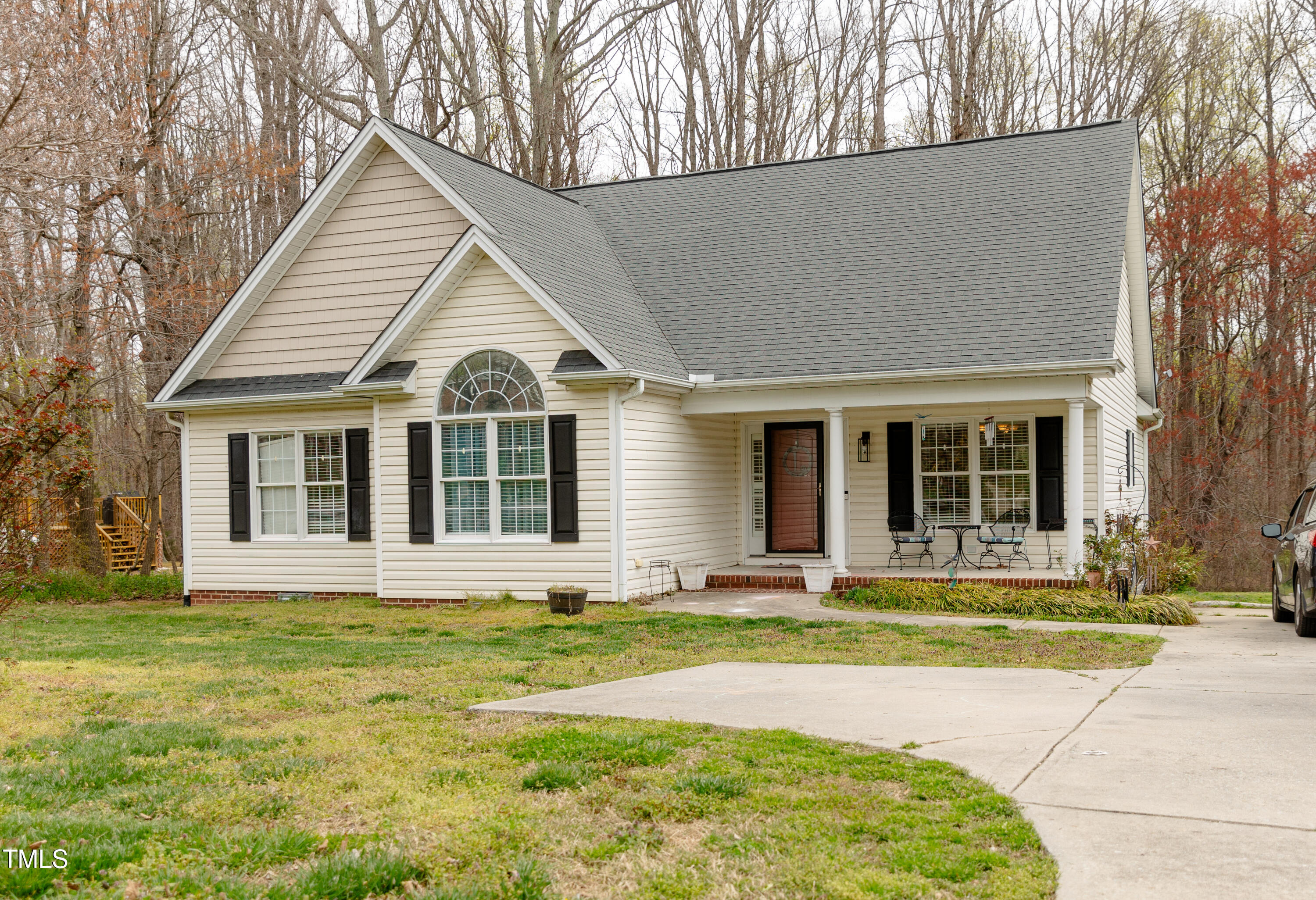 102 Younger Road Roxboro, NC 27573 - Photo 18 of 23 a front view of a house with a yard