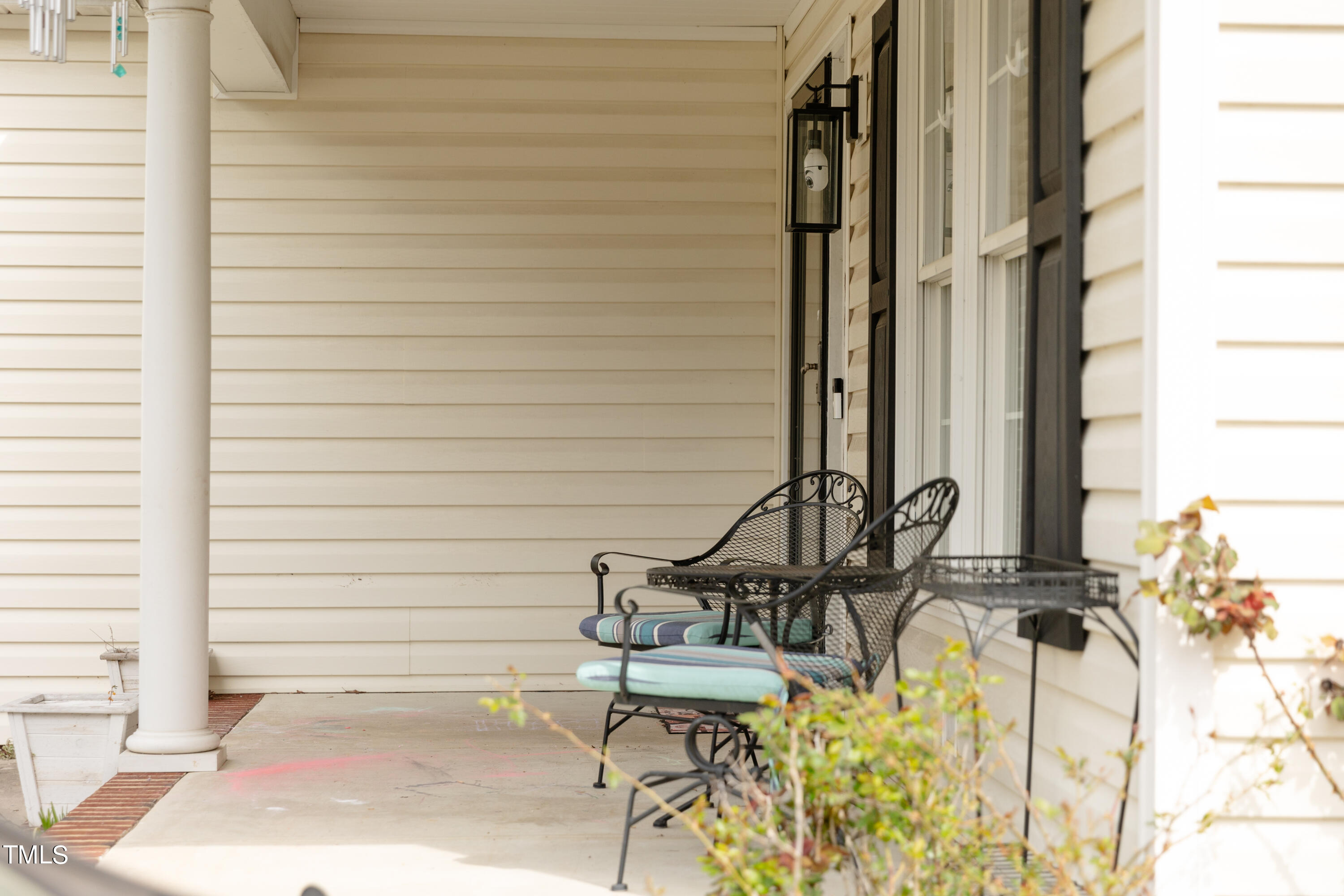 102 Younger Road Roxboro, NC 27573 - Photo 20 of 23 a view of balcony with two chairs and a rug