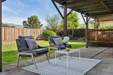 a view of balcony with wooden floor