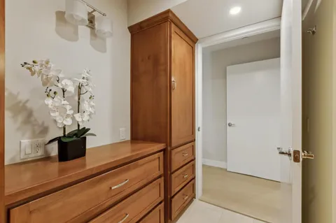 a bathroom with a shower and a mirror
