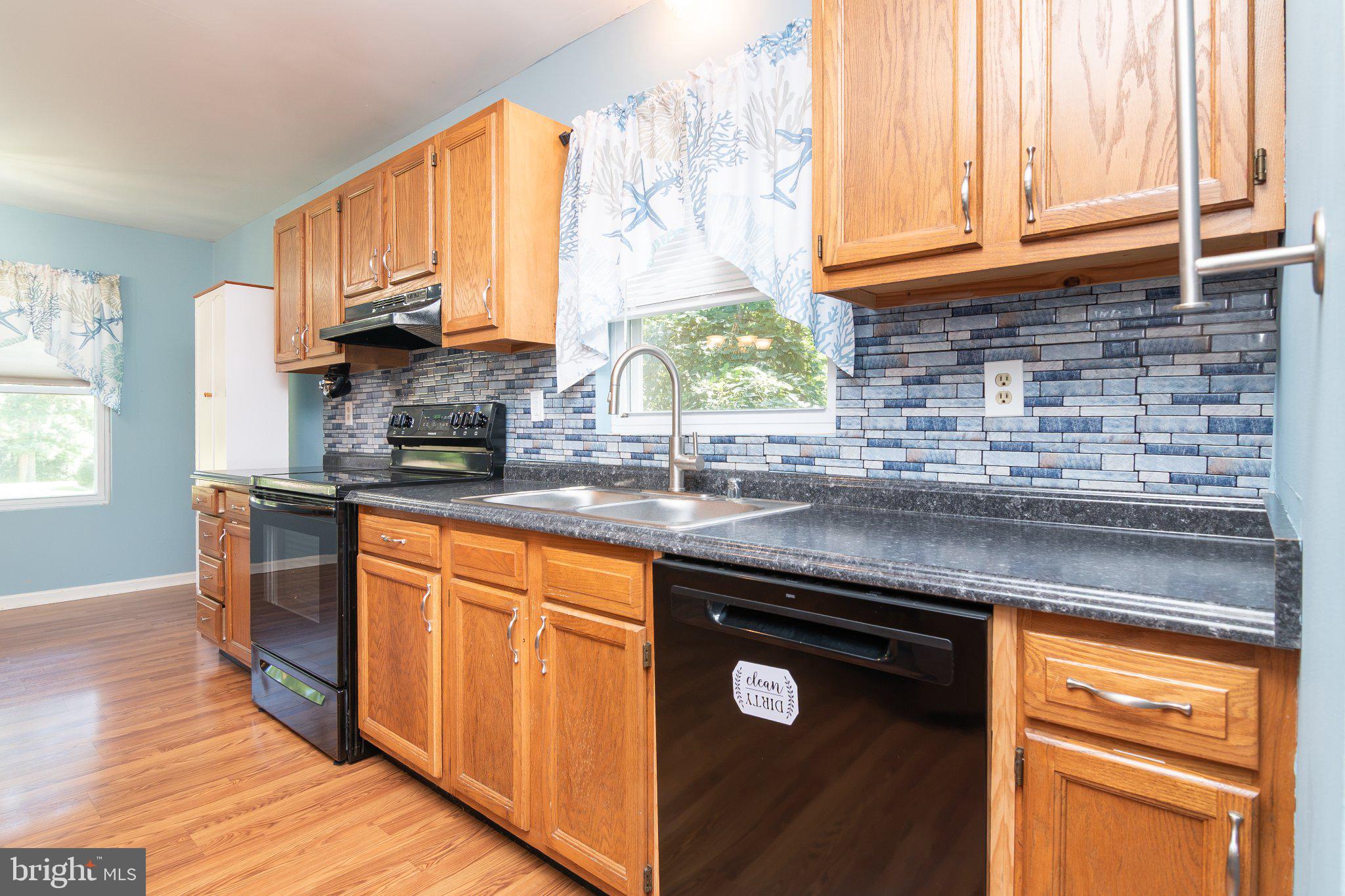 2792 Meadowbrook Road Federalsburg, MD 21632 - Photo 5 of 37 Charming kitchen with modern finishes.