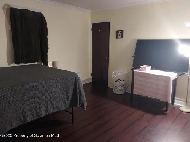 a room with lots of furniture and a window