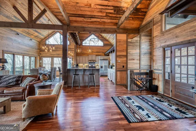 a view of a chairs and table in the balcony