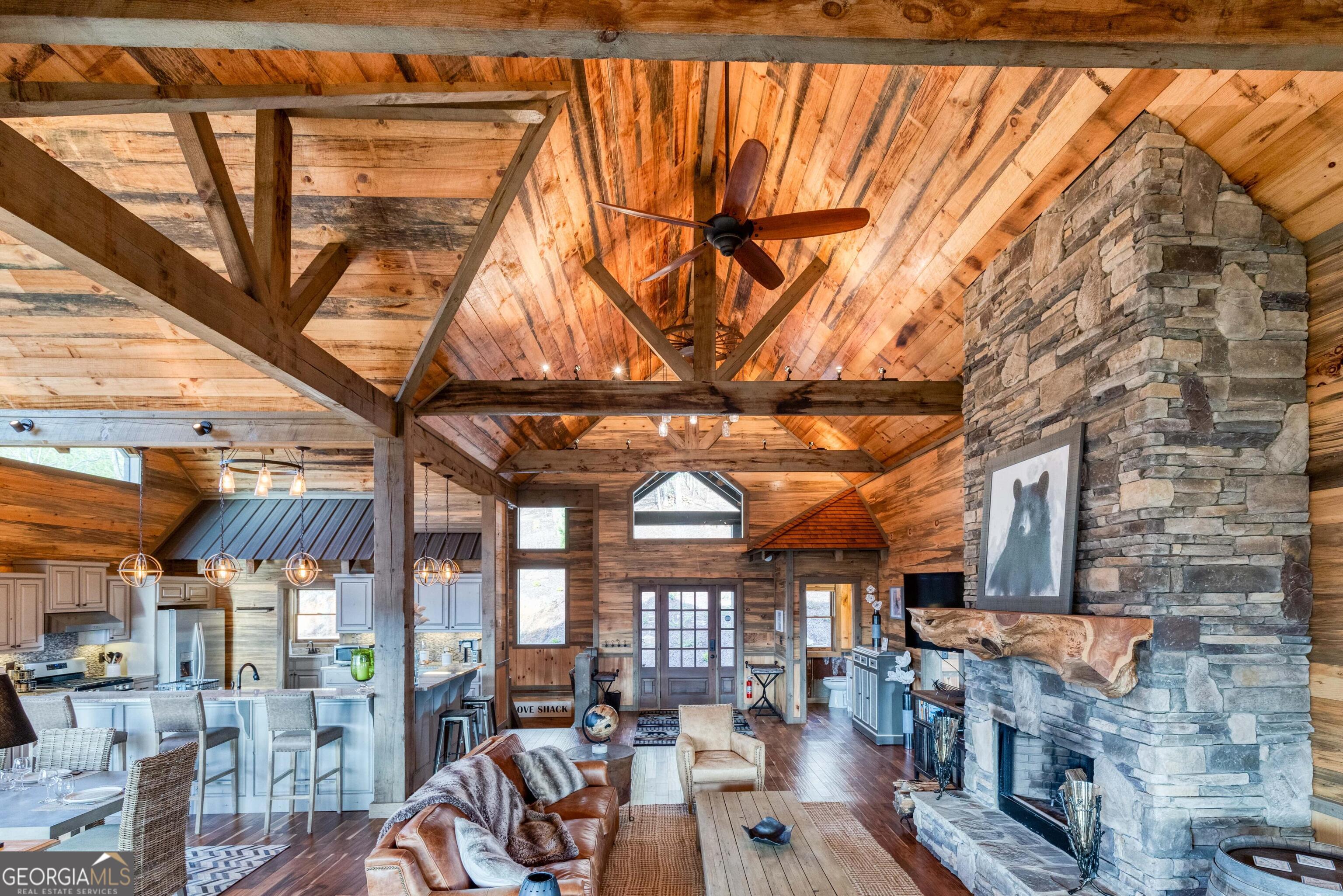 272 Heights Overlook Cherry Log, GA 30522 - Photo 19 of 33 a room with lots of furniture and a chandelier