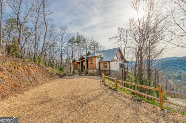 a front view of a house with a porch