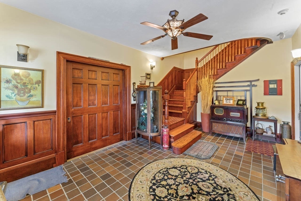 388 Arborway Boston, MA 02130 - Photo 4 of 29 a bedroom with natural light and wooden floor
