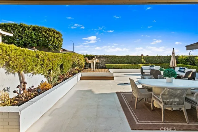 a view of a chairs and table in the terrace