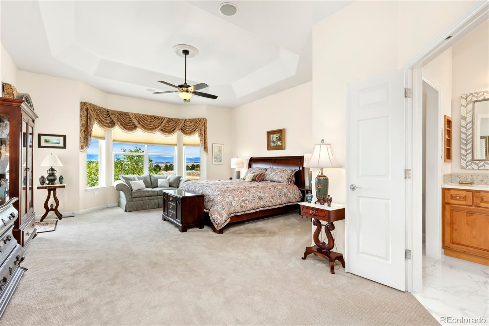 4945 Bierstadt Loop Broomfield, CO 80023 - Photo 17 of 33 a bedroom with furniture and a window