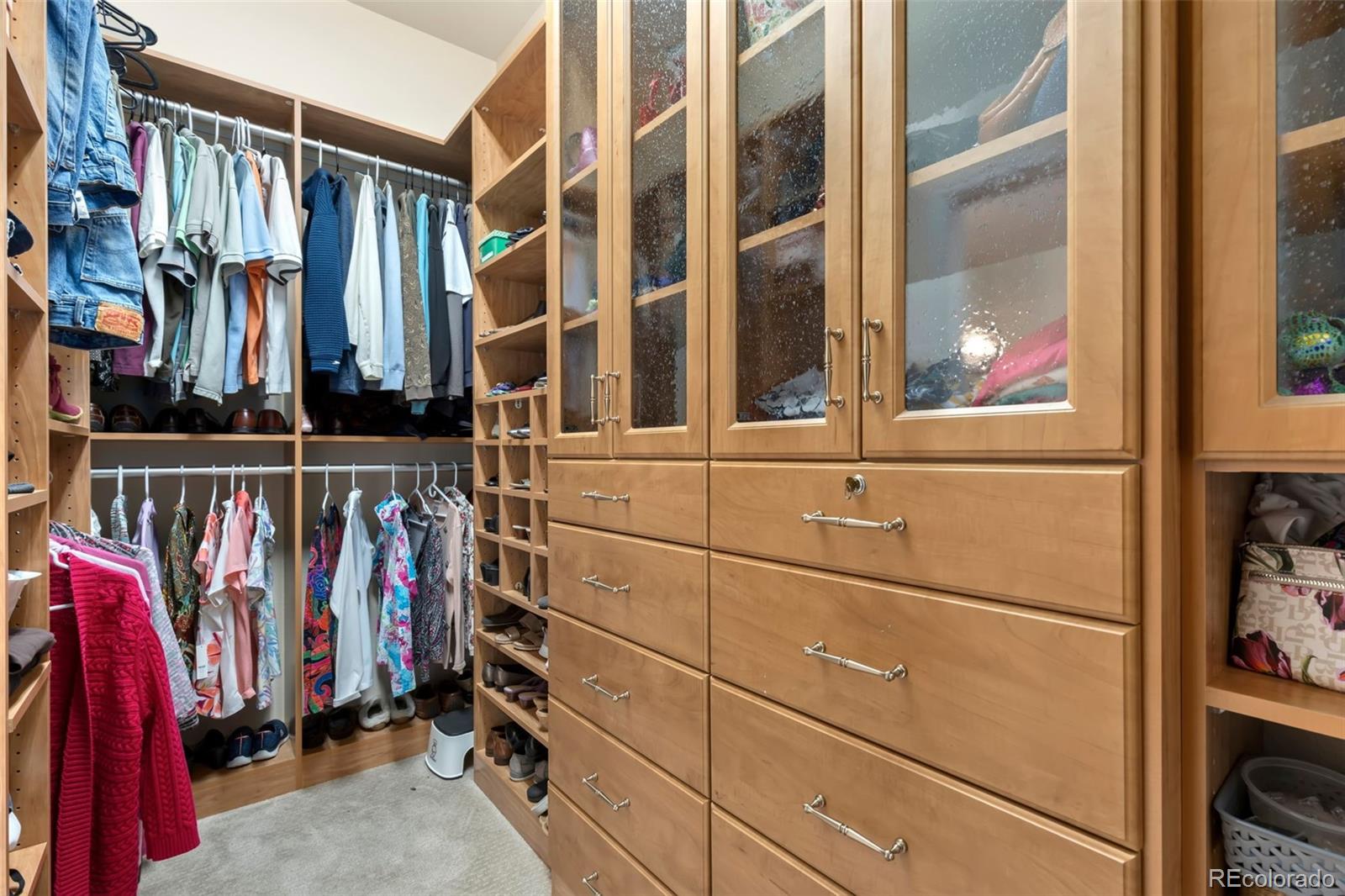 4945 Bierstadt Loop Broomfield, CO 80023 - Photo 20 of 33 a view of walk in closet with clothes and shoes
