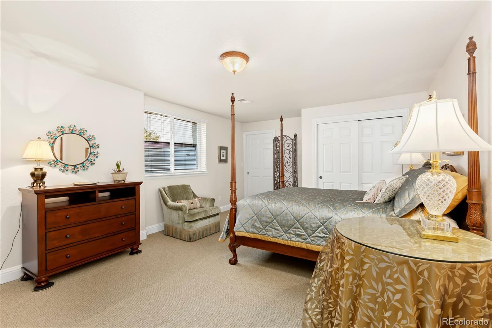 4945 Bierstadt Loop Broomfield, CO 80023 - Photo 26 of 33 a bedroom with bed and window