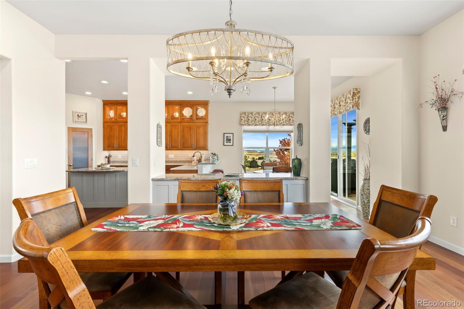 4945 Bierstadt Loop Broomfield, CO 80023 - Photo 8 of 33 a view of a dining room with furniture window and outside view