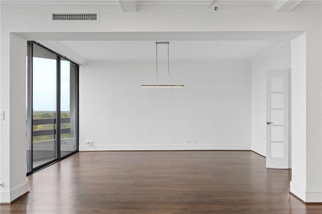 2660 Peachtree Road Northwest, Unit 13F Atlanta, GA 30305 - Photo 16 of 56 wooden floor in an empty room