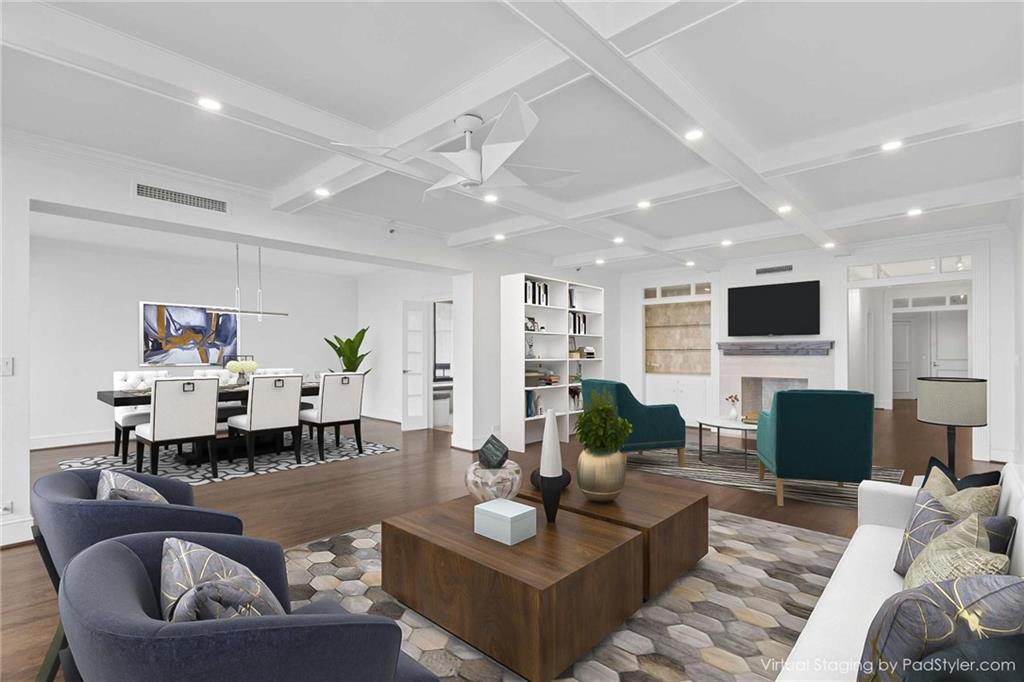 2660 Peachtree Road Northwest, Unit 13F Atlanta, GA 30305 - Photo 3 of 56 a living room with furniture kitchen view and a flat screen tv
