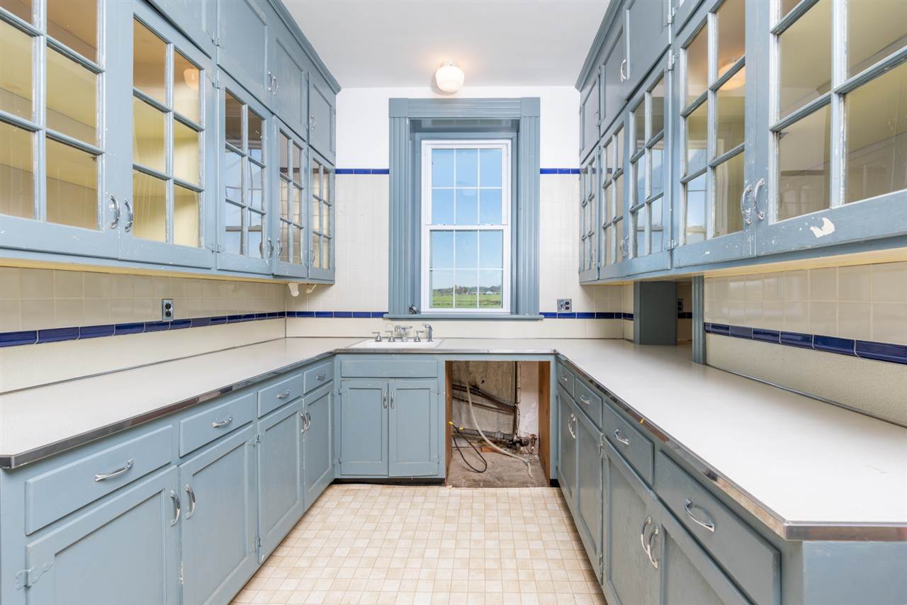 2534 Glebe School Road Swoope, VA 24479 - Photo 15 of 50 a kitchen with a sink and cabinets