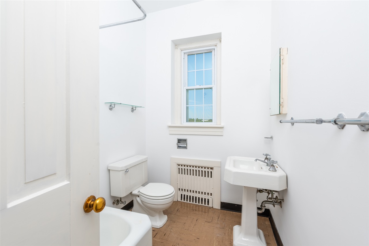 2534 Glebe School Road Swoope, VA 24479 - Photo 39 of 50 a bathroom with a sink a toilet and a mirror