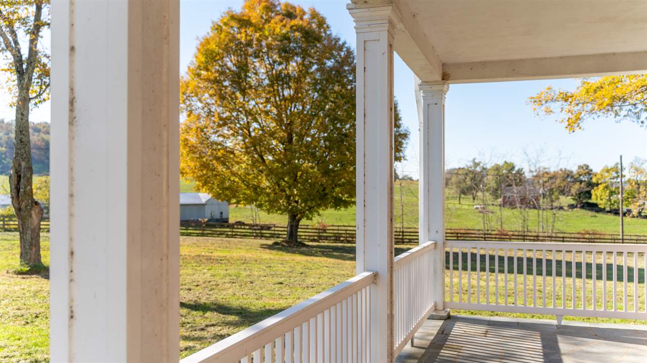 2534 Glebe School Road Swoope, VA 24479 - Photo 42 of 50 a view of a porch with wooden floor and fence