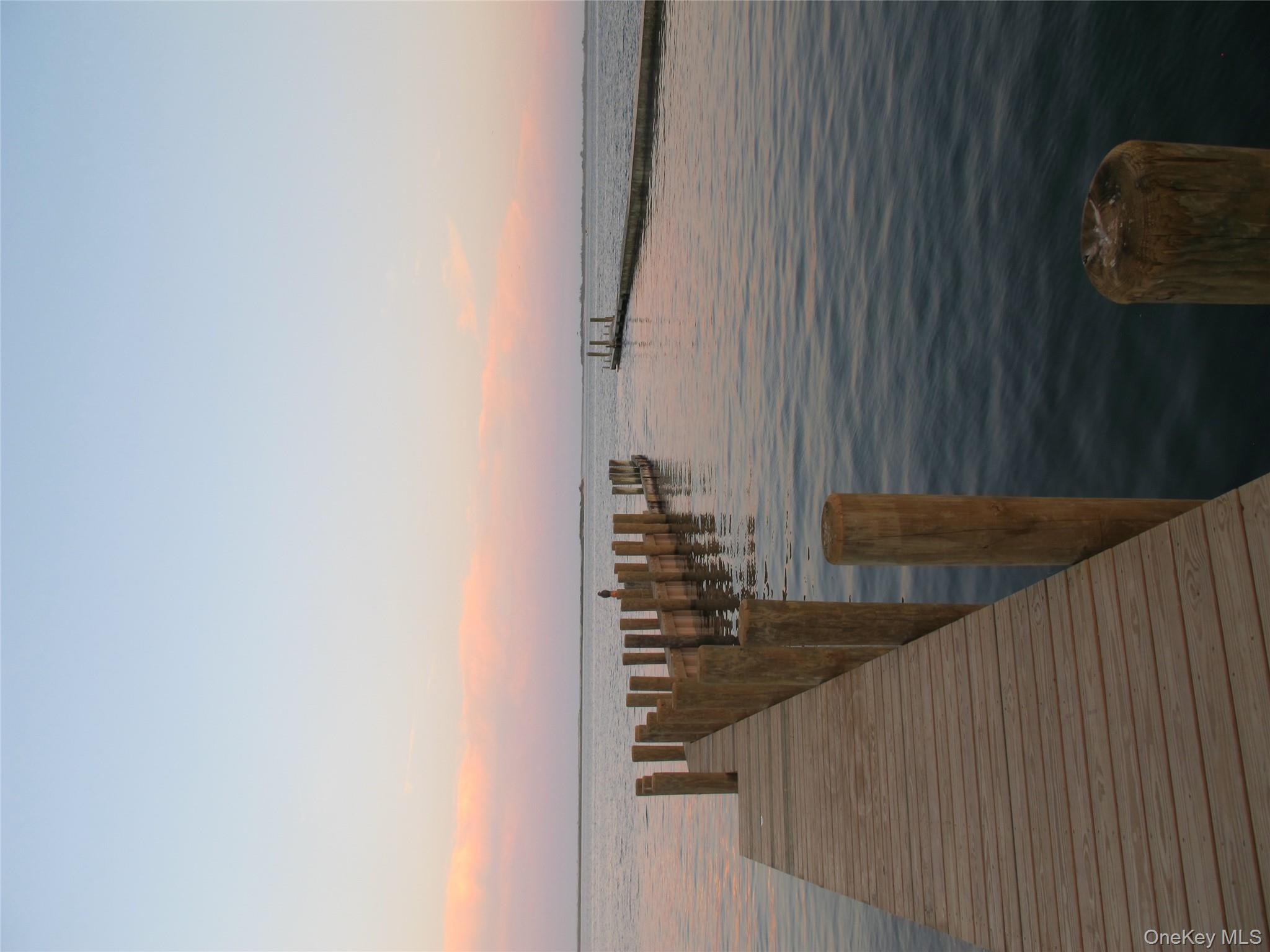 40 Tuthill Point Road East Moriches, NY 11940 - Photo 5 of 28 a view of ocean from a balcony