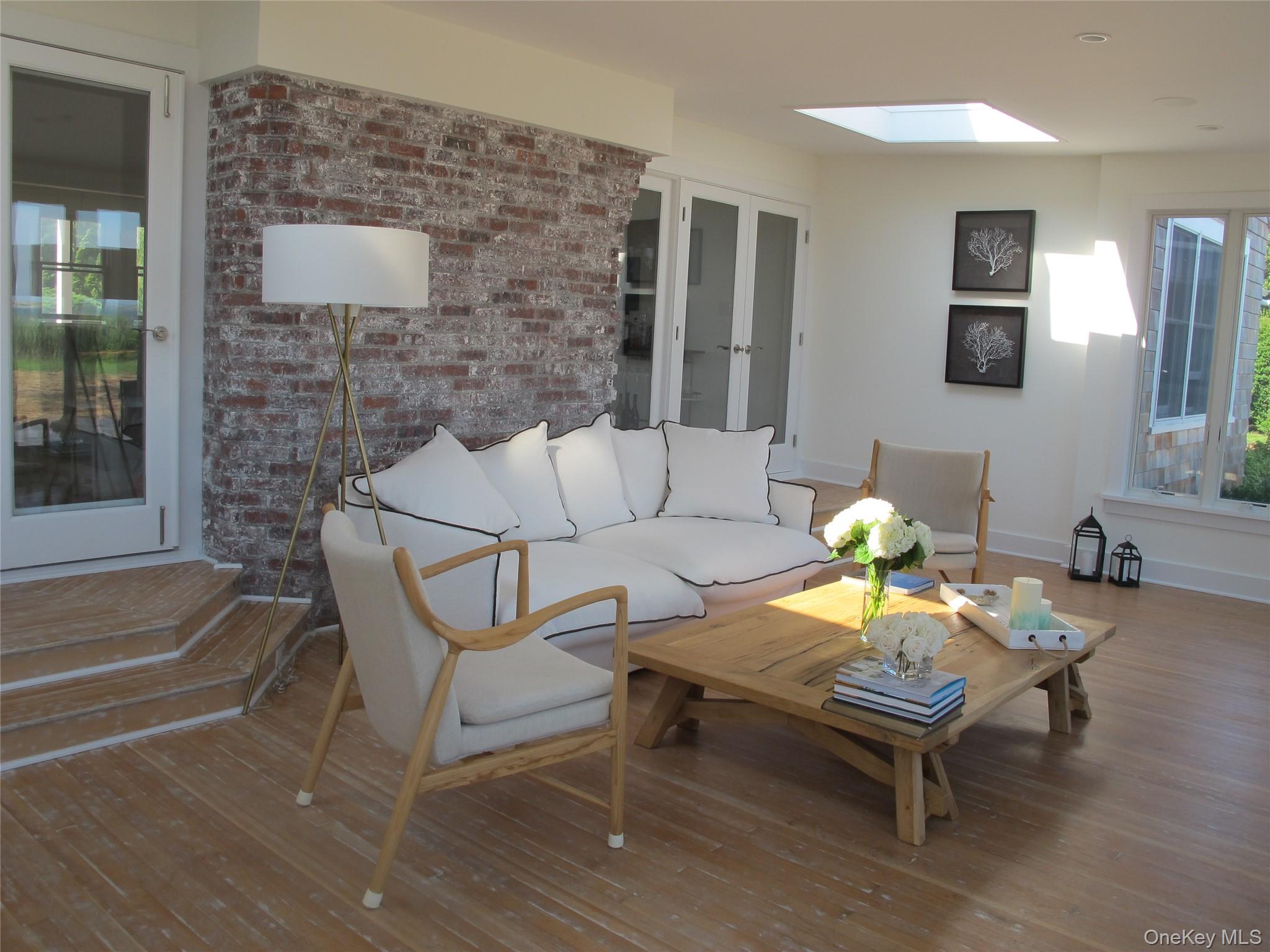 40 Tuthill Point Road East Moriches, NY 11940 - Photo 9 of 28 a living room with furniture and wooden floor