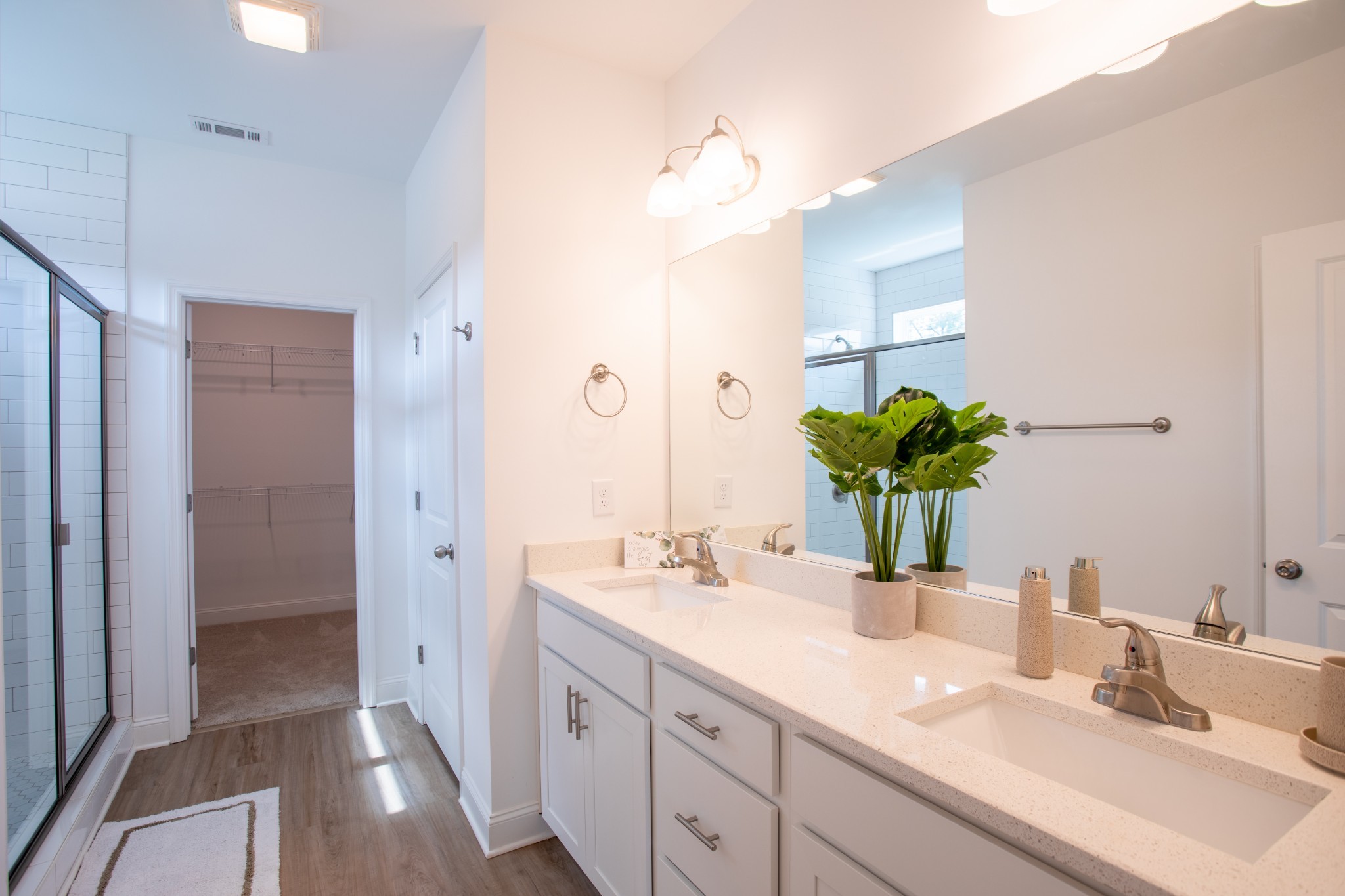 4885 Dyno Loop Chattanooga, TN 37415 - Photo 12 of 17 a bathroom with a double vanity sink and a mirror